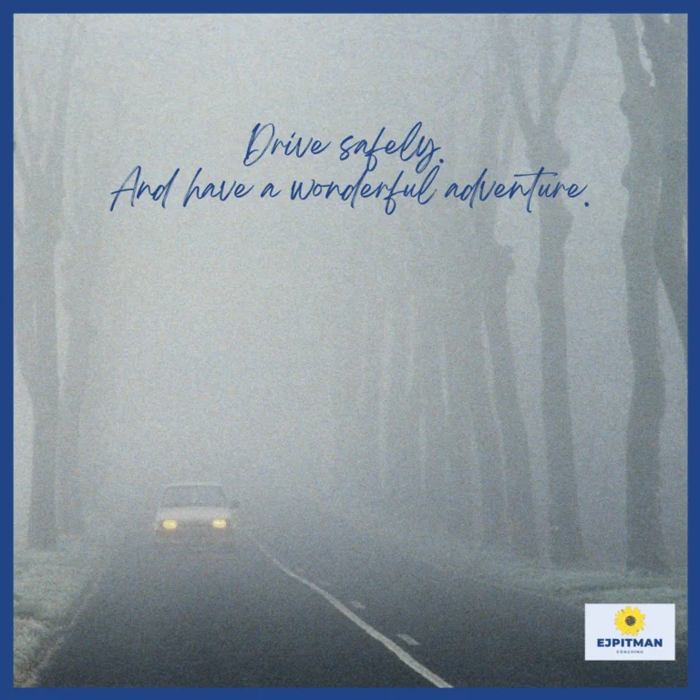 car driving through foggy woods with headlights on