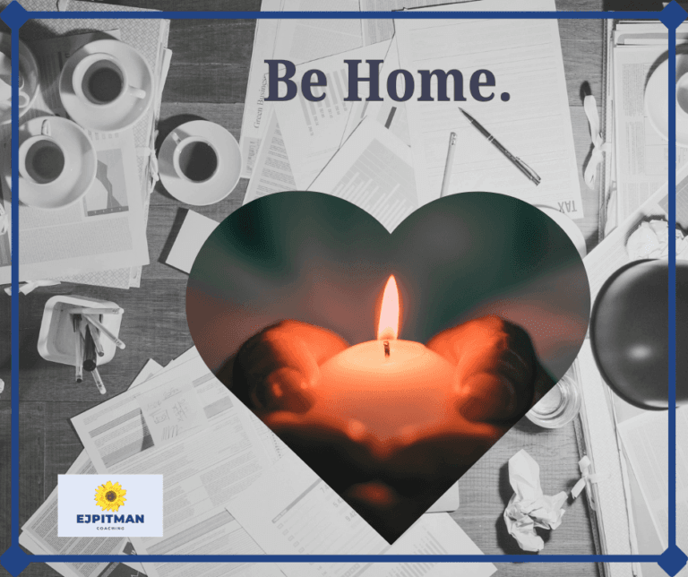messy table with a photo of hands holding a candle in a heart frame and a the words "Be Home".