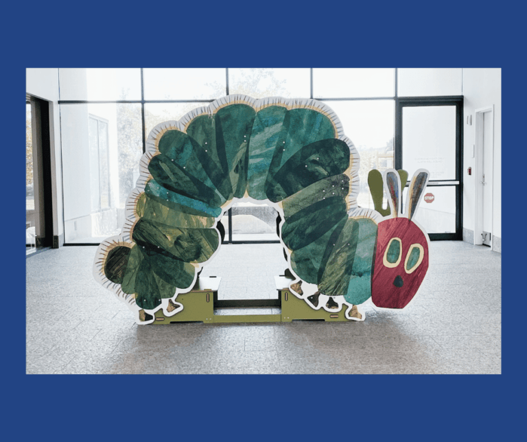 Eric Carle Hungry Caterpillar Display in fron of windows