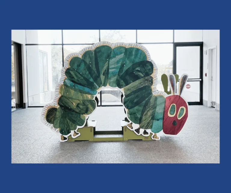Eric Carle Hungry Caterpillar Display in fron of windows